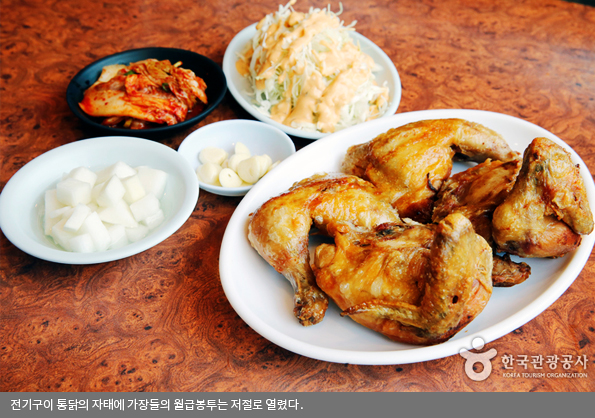 전기구이 통닭의 자태에 가장들의 월급봉투는 저절로 열렸다